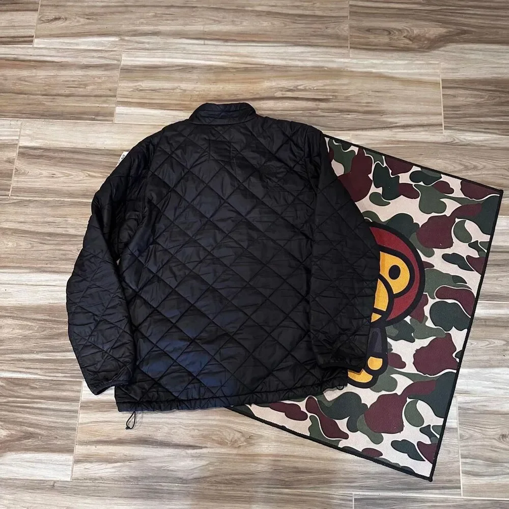 The North Face black quilted diamond pattern puffer jacket